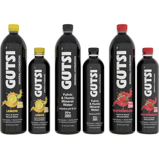 Six GUTSI Hydration mineral water bottles  feature colorful labels for Lemon, Original, and Watermelon flavors.