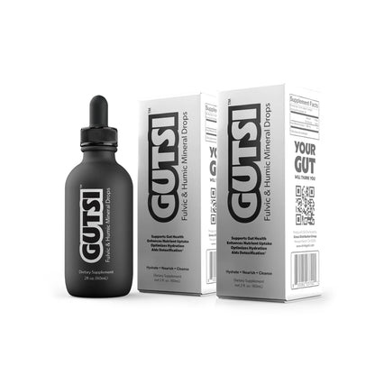 A black dropper bottle labeled GUTSI next to two white product boxes with large black GUTSI branding, shown on a clean white background.